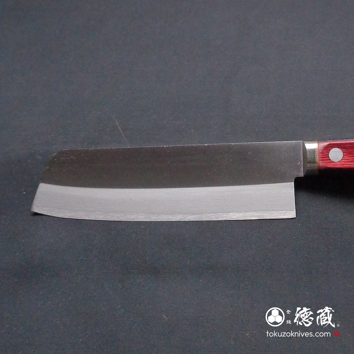 Blue S vegetable knife with red and black handle